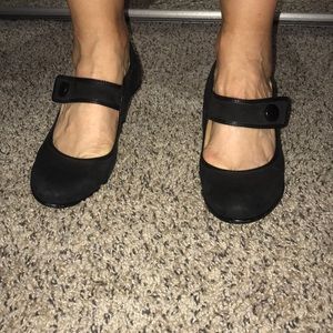 A pair of black low heels by Sofft.